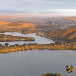 a view of water and a mountain in the background