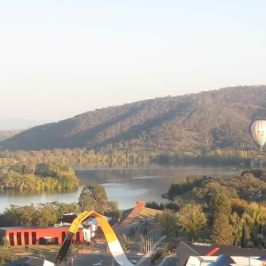 a view of a body of water with a mountain in the background