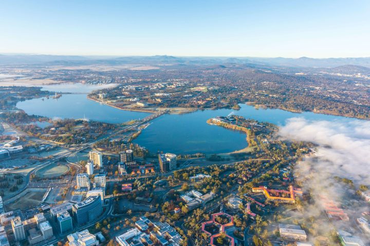 a view of a body of water with a mountain in the background