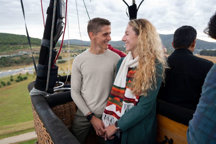 a man holding a kite