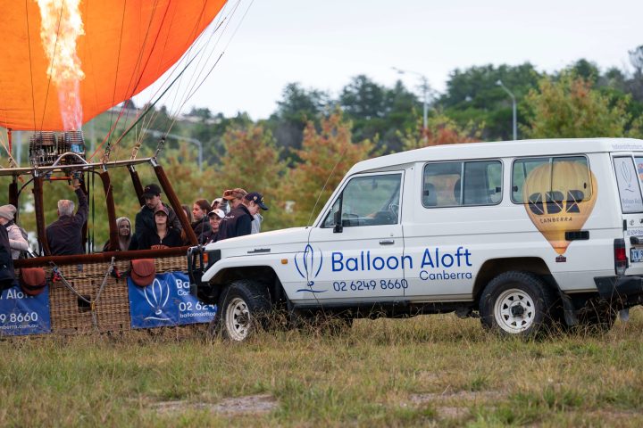 a truck is parked in the grass